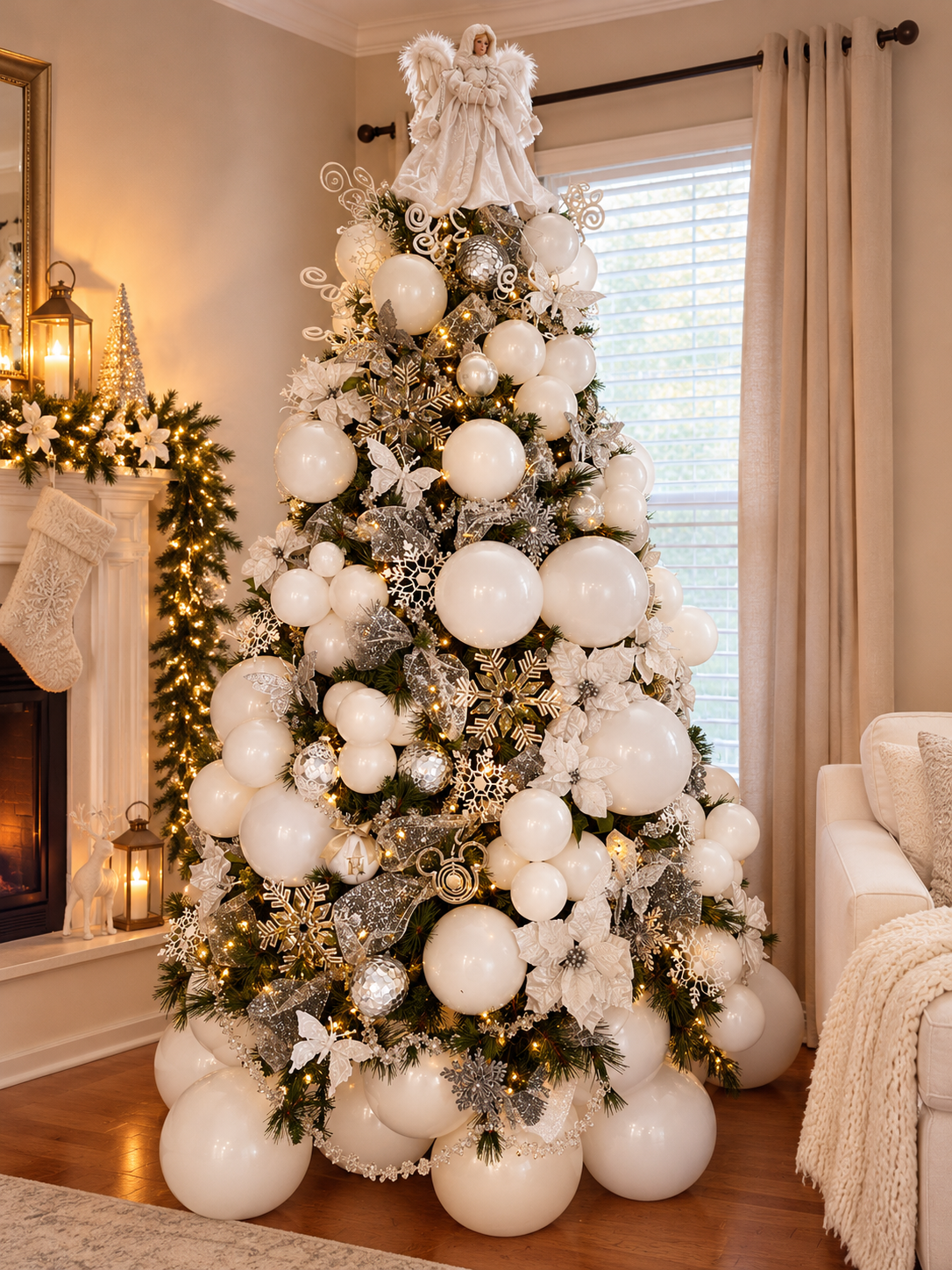 Elegant white and silver balloon Christmas tree with angel topper